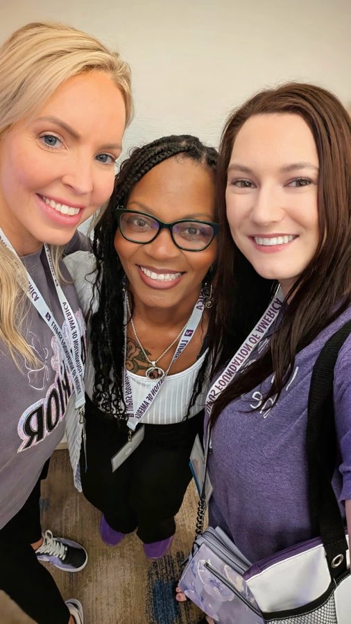 Dr. Cece with two women wearing Lupus Foundation lanyards